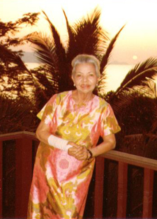 Connie mangskau on deck overlooking  the ocean in Thailand